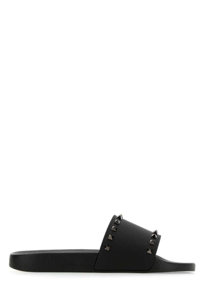 Shop Valentino Garavani Slippers In Black