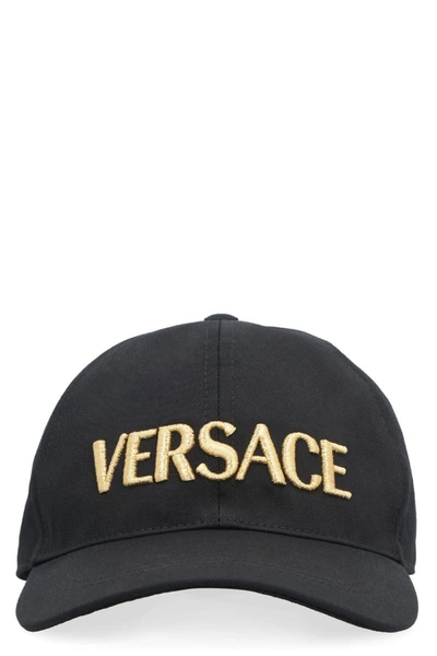 Shop Versace Caps & Hats In Black Gold