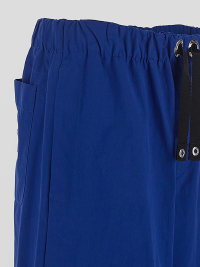 Shop Versace Trousers In Electric Blue