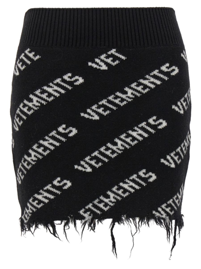 Shop Vetements Monogram Mini Skirt In White/black