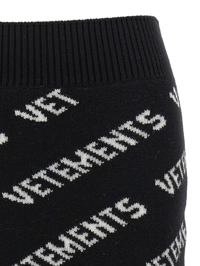 Shop Vetements Monogram Mini Skirt In White/black