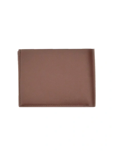 Shop Jil Sander Zipped Wallet In Brown