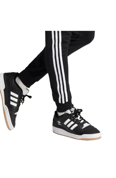Shop Adidas Originals Lifestyle Superstar Joggers In Black/ White