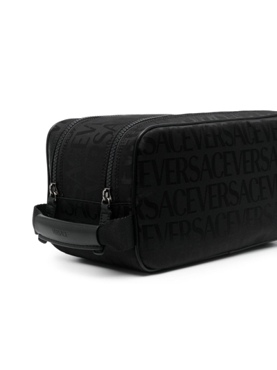 Shop Versace Logo-print Wash Bag In Black