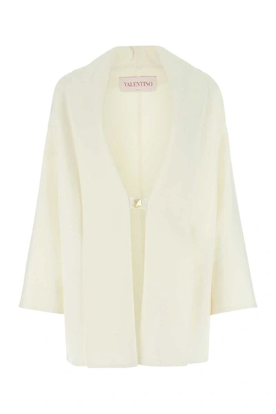 Shop Valentino Garavani Coats In White