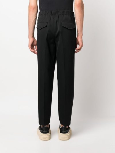 Jil Sander Elasticated-waistband Tapered Trousers In Black