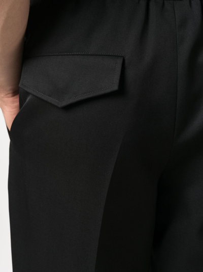 Jil Sander Elasticated-waistband Tapered Trousers In Black