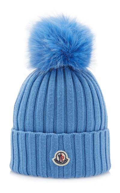 Shop Moncler Fur-trimmed Ribbed-knit Wool Beanie In Blue