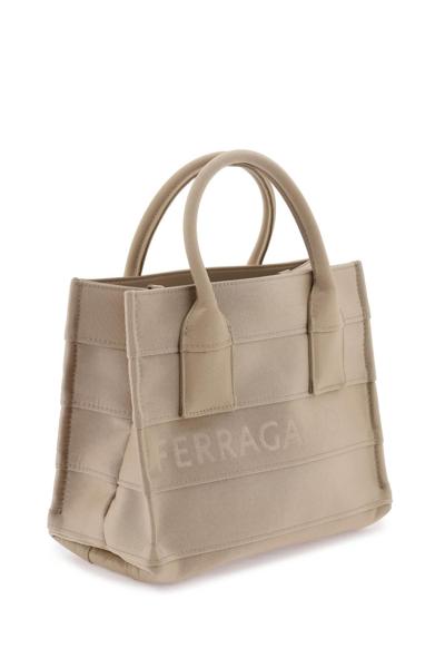 Shop Ferragamo Lettering Logo Small Tote Bag In Beige