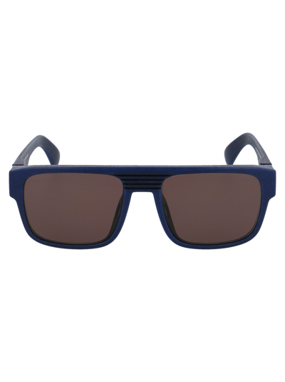 Shop Mykita Ridge Sunglasses In 325 Md25 Navy Blue | Brown Solid