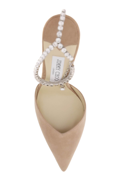 Shop Jimmy Choo Saeda 100 Suede Pumps In Ballet Pink Crystal (beige)
