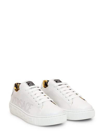 Shop Versace La Greca Sneaker In Bianco Nero Oro