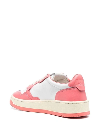 Shop Autry Pink And White 'medalist' Low Top Sneakers In Cow Leather In Fuxia