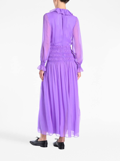 Shop Adam Lippes Ruffled Smocked Silk Maxi Dress In Violett