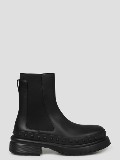 Shop Valentino M-way Rockstud Ankle Boot In Black