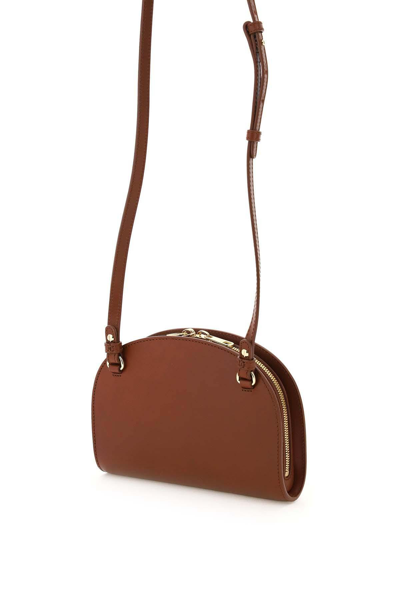 Shop Apc Demi-lune Leather Clucth In Brown