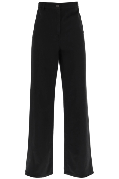 Shop The Row 'delton' Pants With Flared Leg In Black