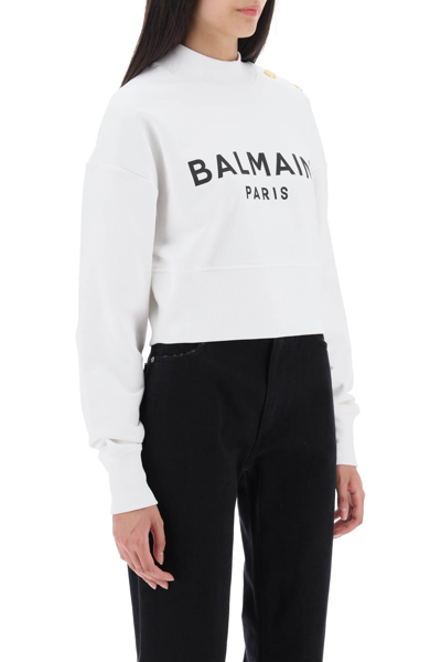 Shop Balmain Cropped Sweatshirt With Logo Print And Buttons In White