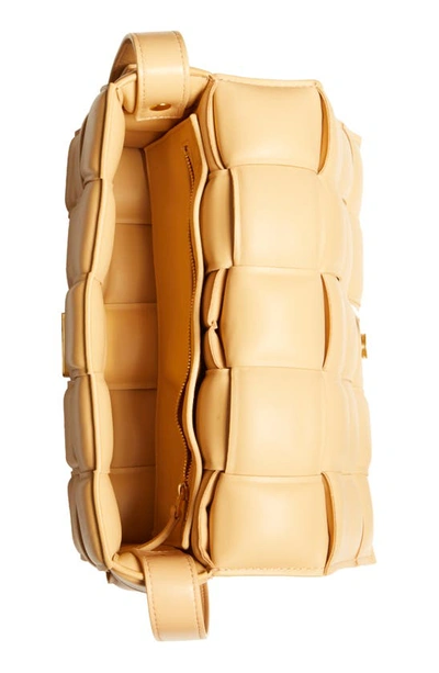 Shop Bottega Veneta Padded Cassette Bag In Almond-gold