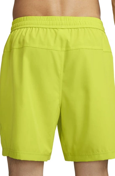 Shop Nike Form Dri-fit Athletic Shorts In Bright Cactus/ Black
