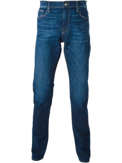Frame Distressed Straight Fit Jeans In Blue