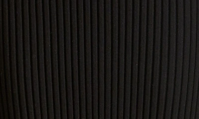 Shop Khaite Sapphi Rib Knit Peplum Skirt In Black