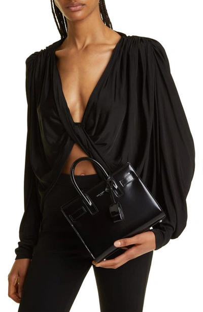 Shop Saint Laurent Nano Sac De Jour Patent Leather Top Handle Bag In Nero