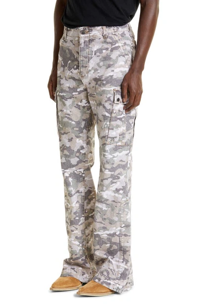 Shop Amiri M65 Camouflage Print Kick Flare Leg Cargo Jeans In Green Camo