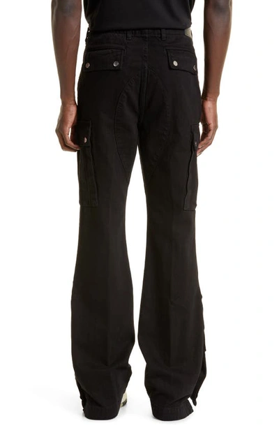 Amiri M65 Distressed Split Hem Kick Flare Leg Cargo Jeans In Black