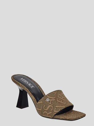 Shop Versace Logo Mules In Beige+brown+palladium