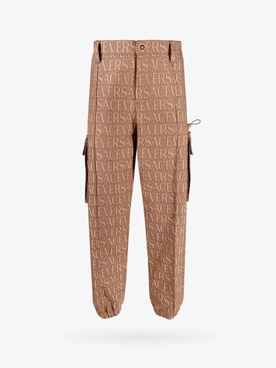 Shop Versace Trouser In Brown