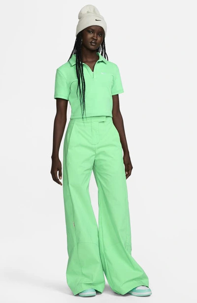 Shop Nike Essentials Stretch Crop Polo In Spring Green/ White