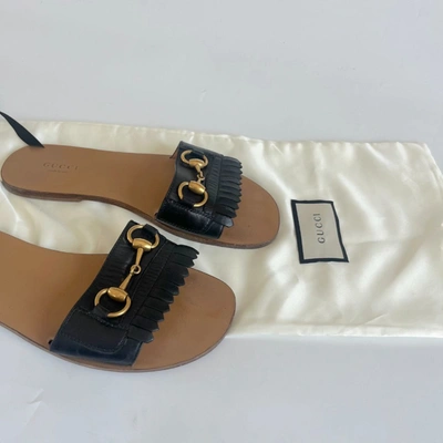 Pre-owned Gucci Black Leather Fringe Slides With Gold Horsebit, 38