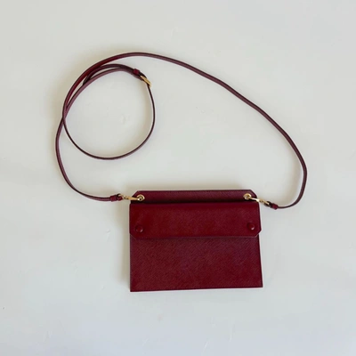 PRADA Pre-owned Burgundy Saffiano Leather Mini Clutch Bag