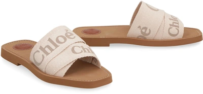 Shop Chloé Woody Leather And Fabric Slides In Beige