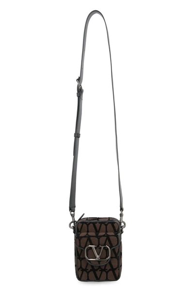 Shop Valentino Garavani - Locò Mini Crossbody Bag In Brown