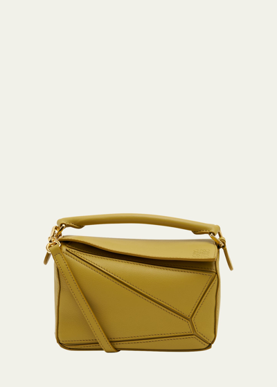 Shop Loewe Puzzle Mini Top-handle Bag In Leather In Bright Ochre