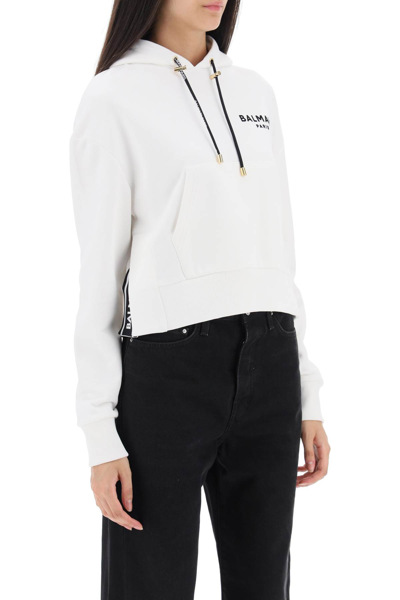 Shop Balmain Cropped Sweatshirt With Flocked Logo Print In Blanc Noir (white)