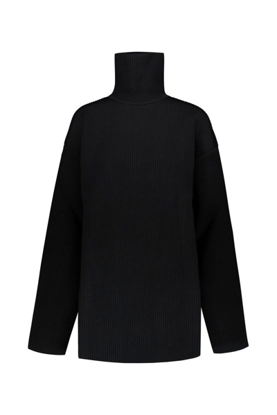Shop Balenciaga Oversized Turtleneck Sweater In Black