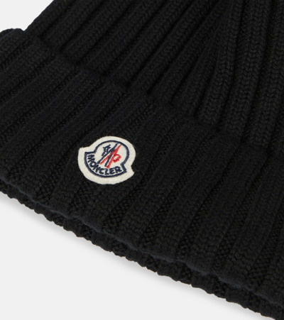 Moncler Wool Rib Beanie With Faux Fur Pompom In Nero | ModeSens