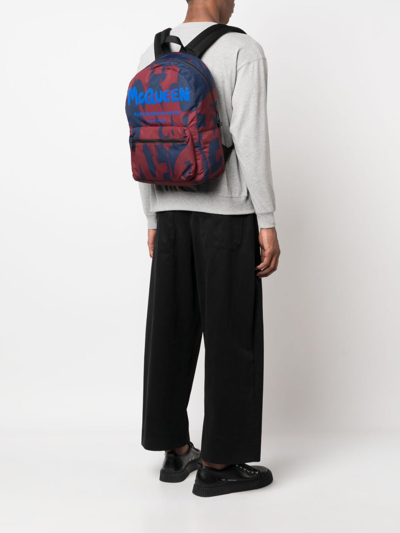 Shop Alexander Mcqueen Graffiti Logo-print Backpack In Blau