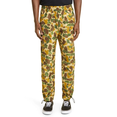 Shop Palm Angels Printed Pants In Green