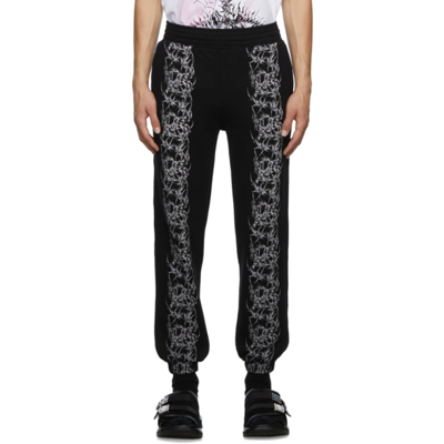 Shop Givenchy Cotton Printed Pants In Black