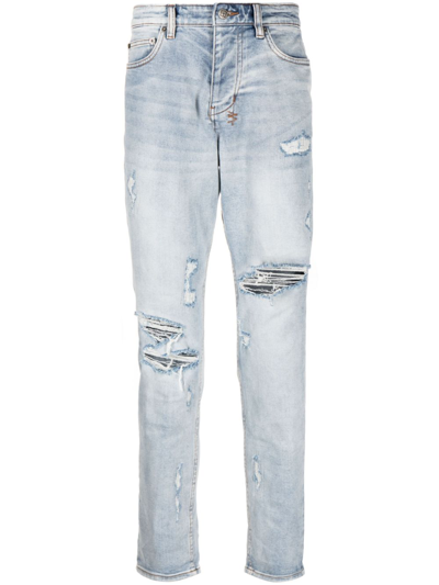 Shop Ksubi Wolfgang Distressed Tapered-leg Jeans In Blue