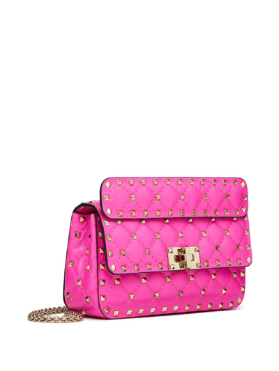 Shop Valentino Small Rockstud Spike Shoulder Bag In Pink