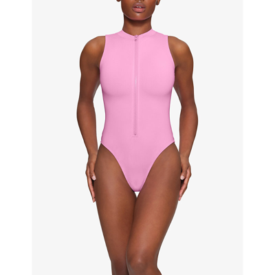 Shop Skims Women's Light Pink Zipped High-neck Recycled Stretch-nylon Swimsuit