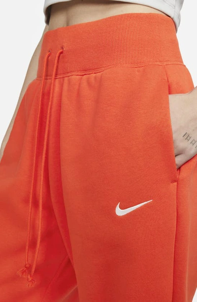Shop Nike Sportswear Phoenix High Waist Fleece Sweatpants In Picante Red/ Sail