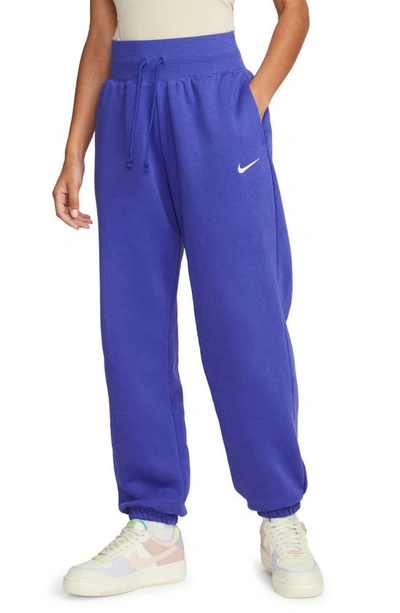 Shop Nike Sportswear Phoenix High Waist Fleece Sweatpants In Lapis/ Sail