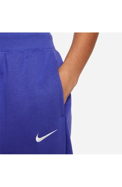 Shop Nike Sportswear Phoenix High Waist Fleece Sweatpants In Lapis/ Sail