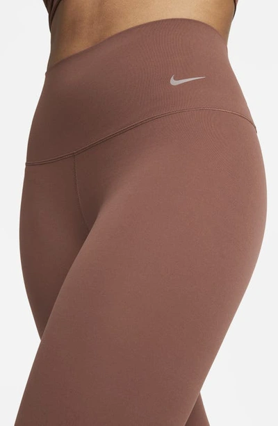Shop Nike Zenvy Gentle Support High Waist 7/8 Leggings In Dark Pony/ Black